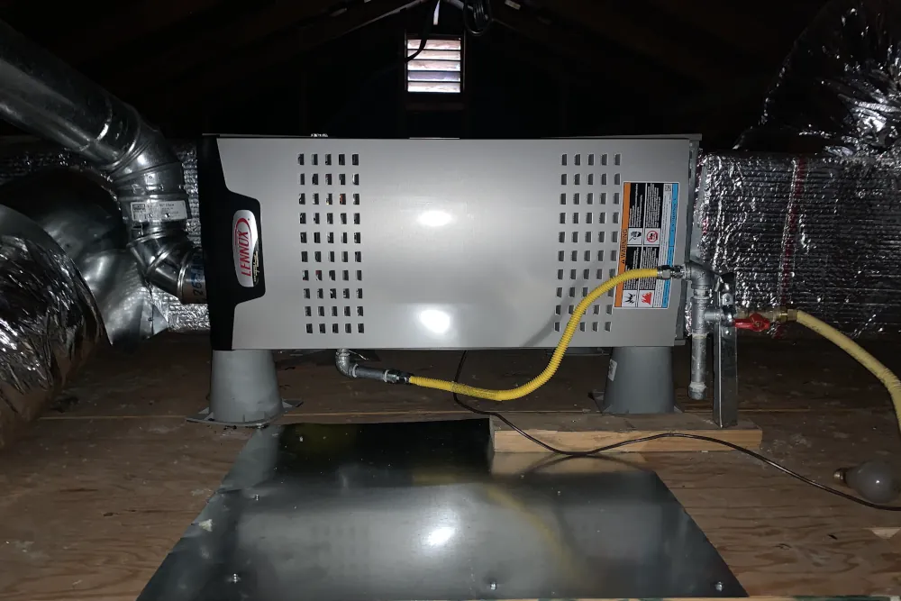 Picture of a newly installed furnace in an attic.