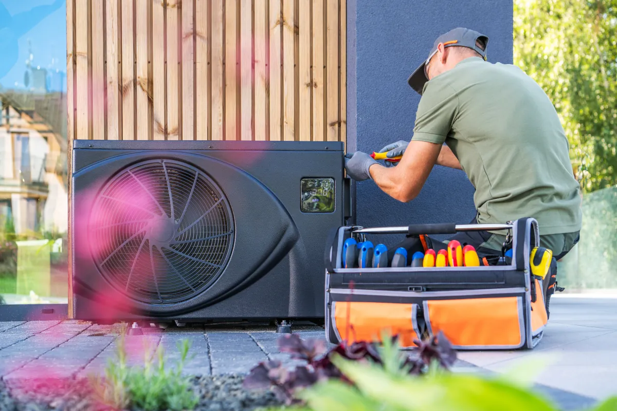 Heat Pump troubleshooting guide. Technician troubleshooting a heat pump.